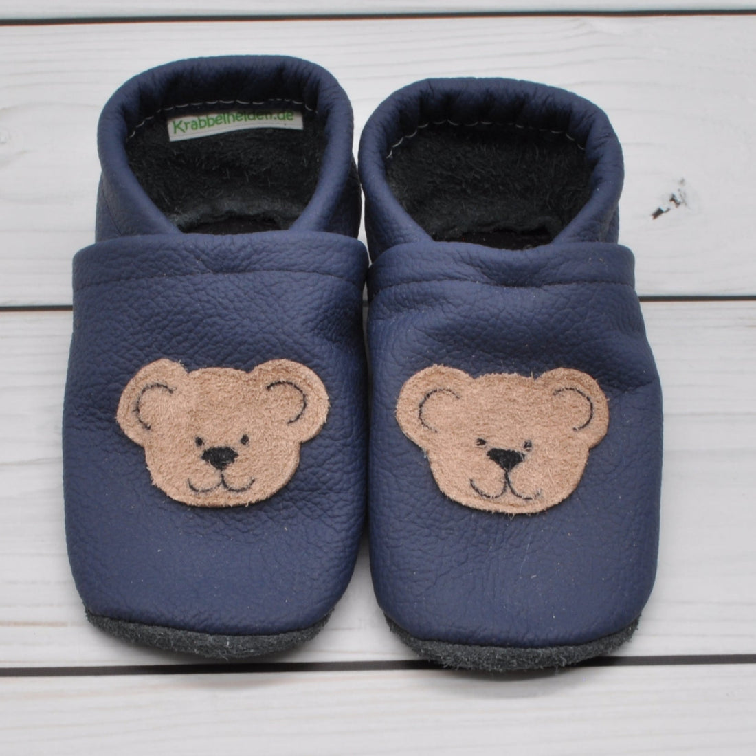 Krabbelschuhe in blau mit aufgenähtem Teddykopf in Größe 24