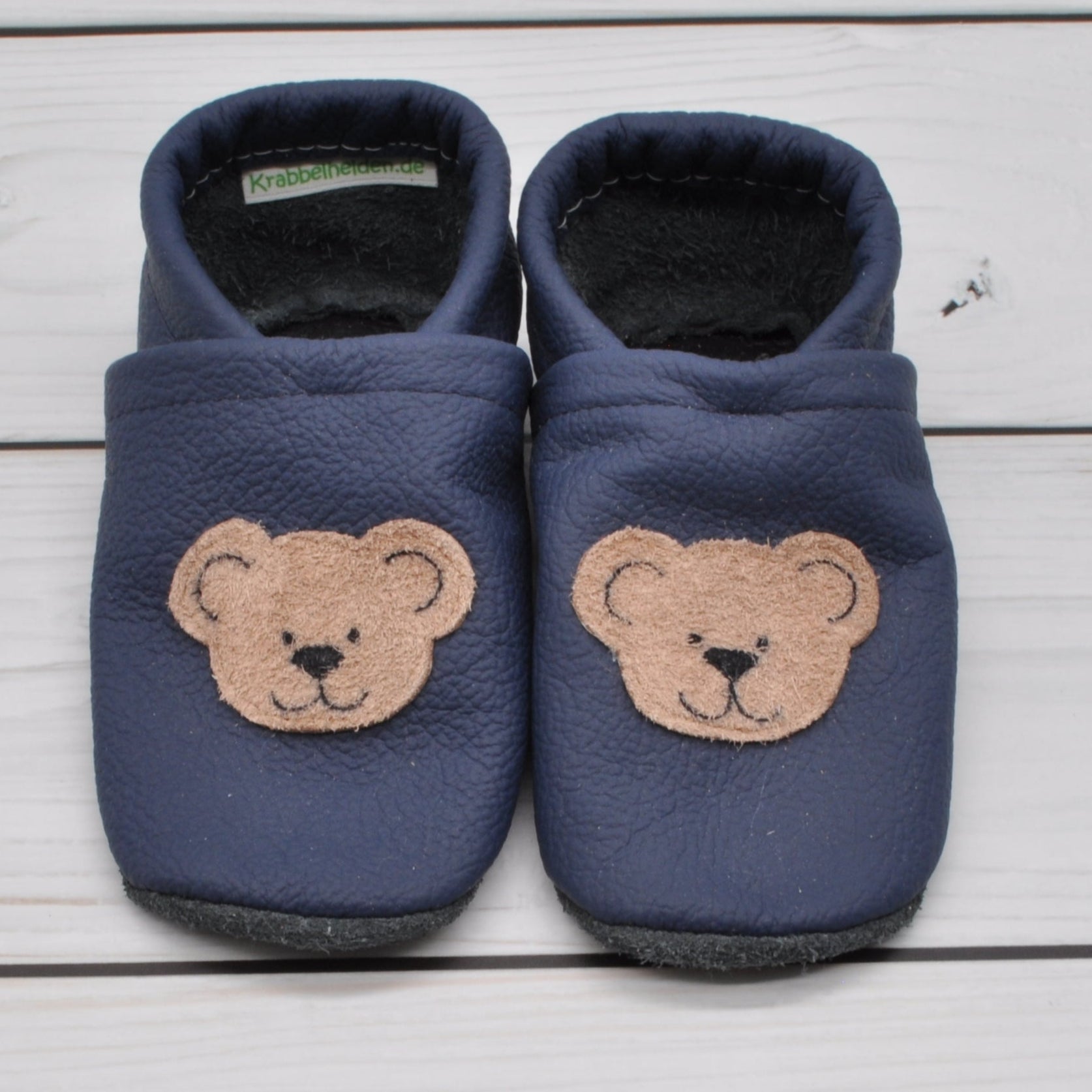 Krabbelschuhe in blau mit aufgenähtem Teddykopf in Größe 24
