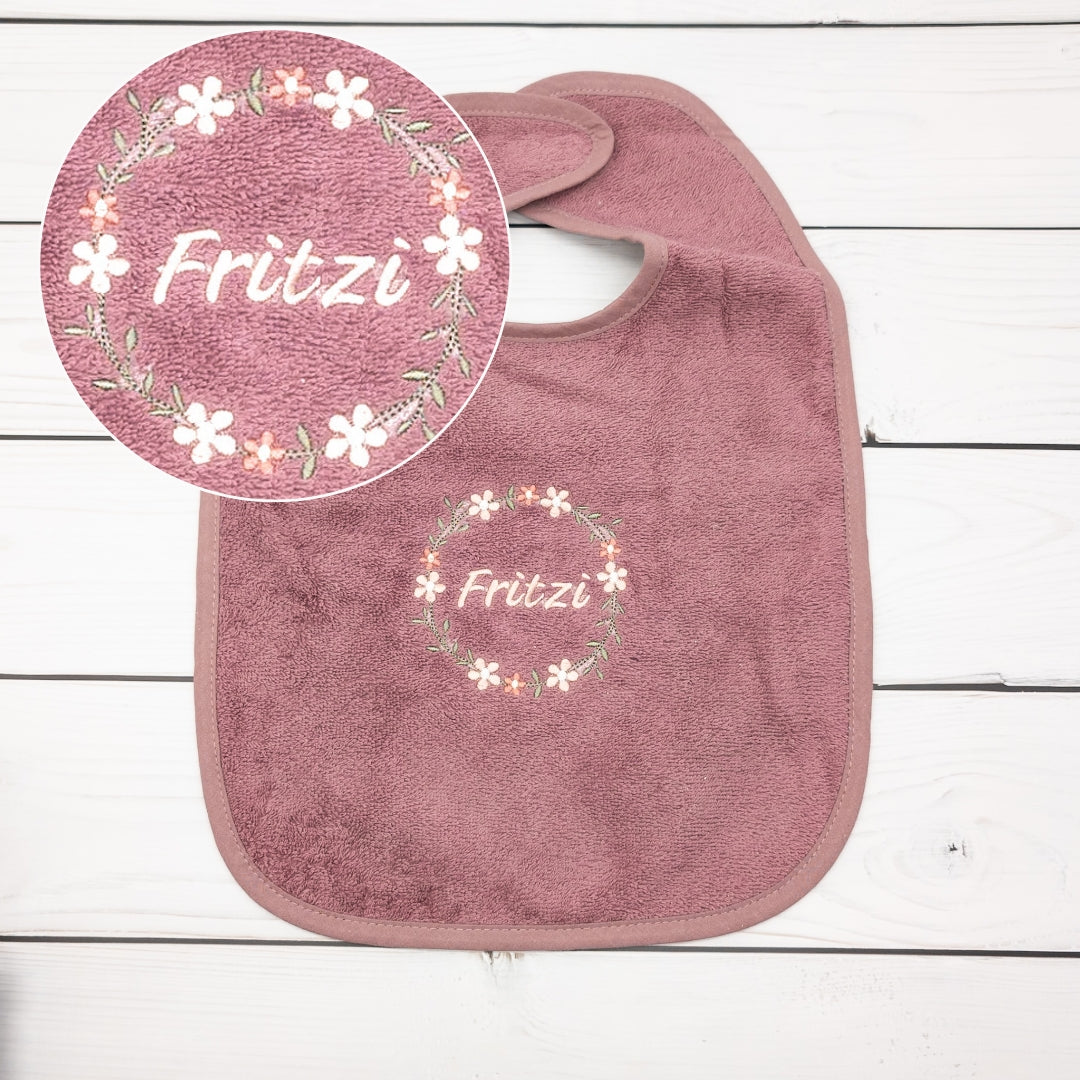 Lätzchen aus Frottee Blumenkranz und Name personalisiert