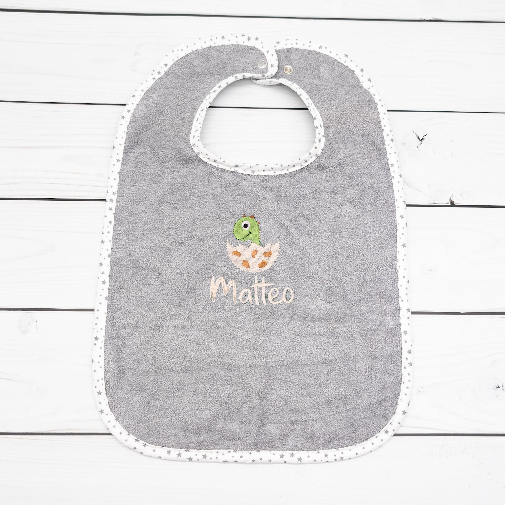 Lätzchen aus Frottee Dino im Ei und Name personalisiert