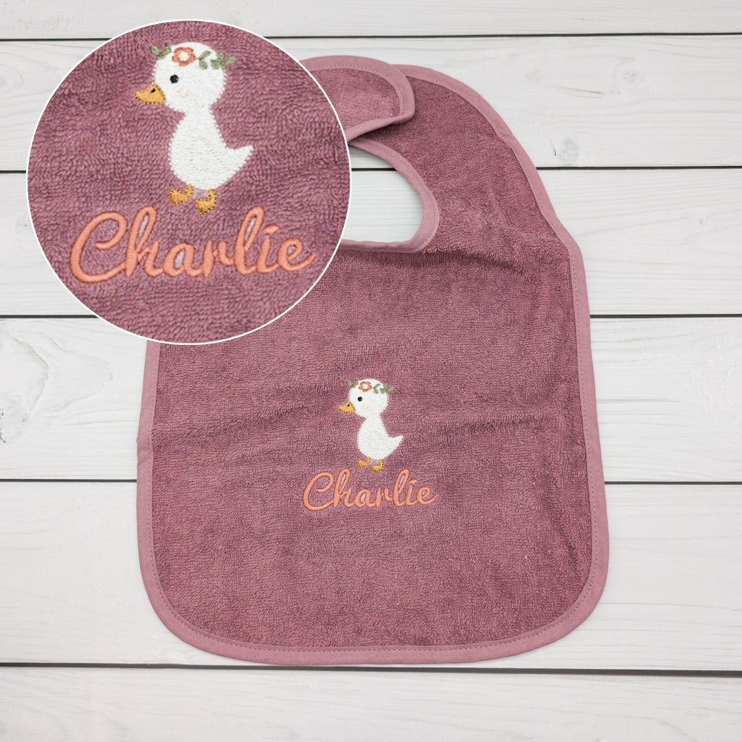 Lätzchen in rosa aus Frottee in rosa mit Gans und Name personalisiert