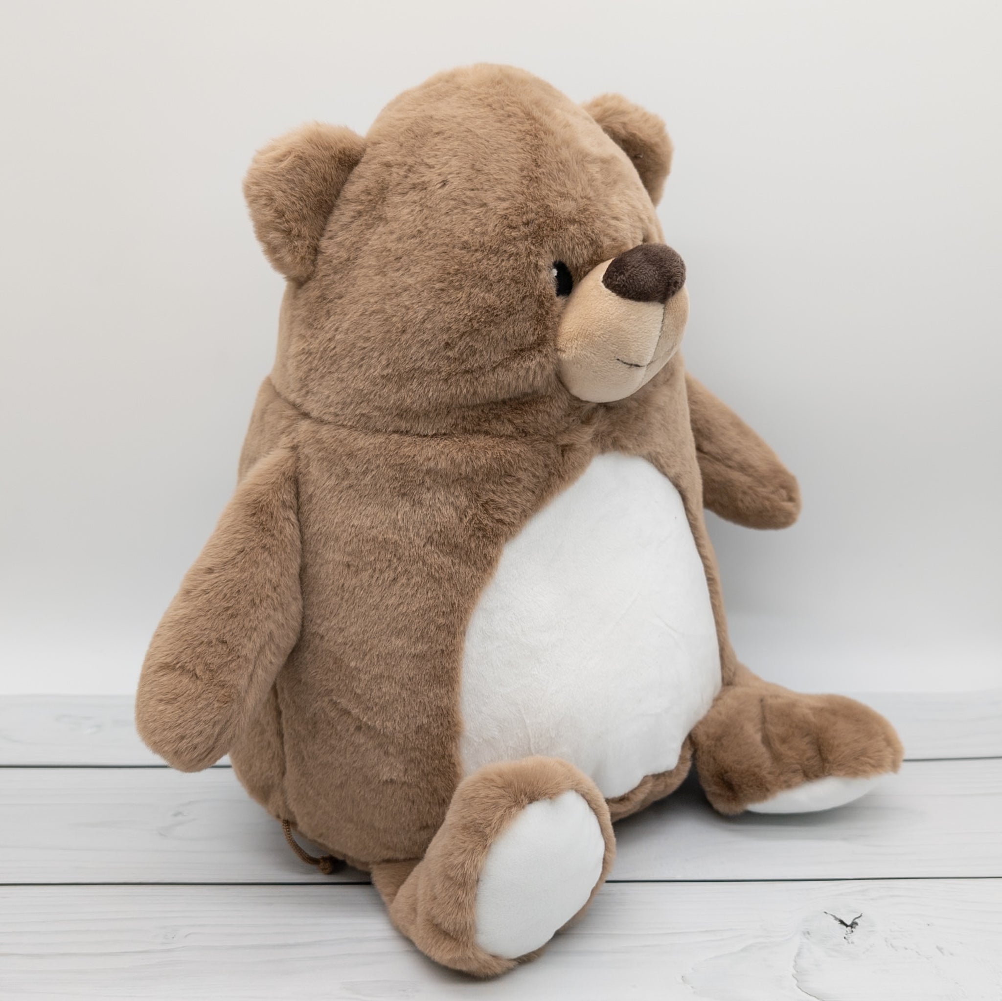 Kuscheltier brauner Bär mit Namen und Geburtsdaten in rosa bestickt