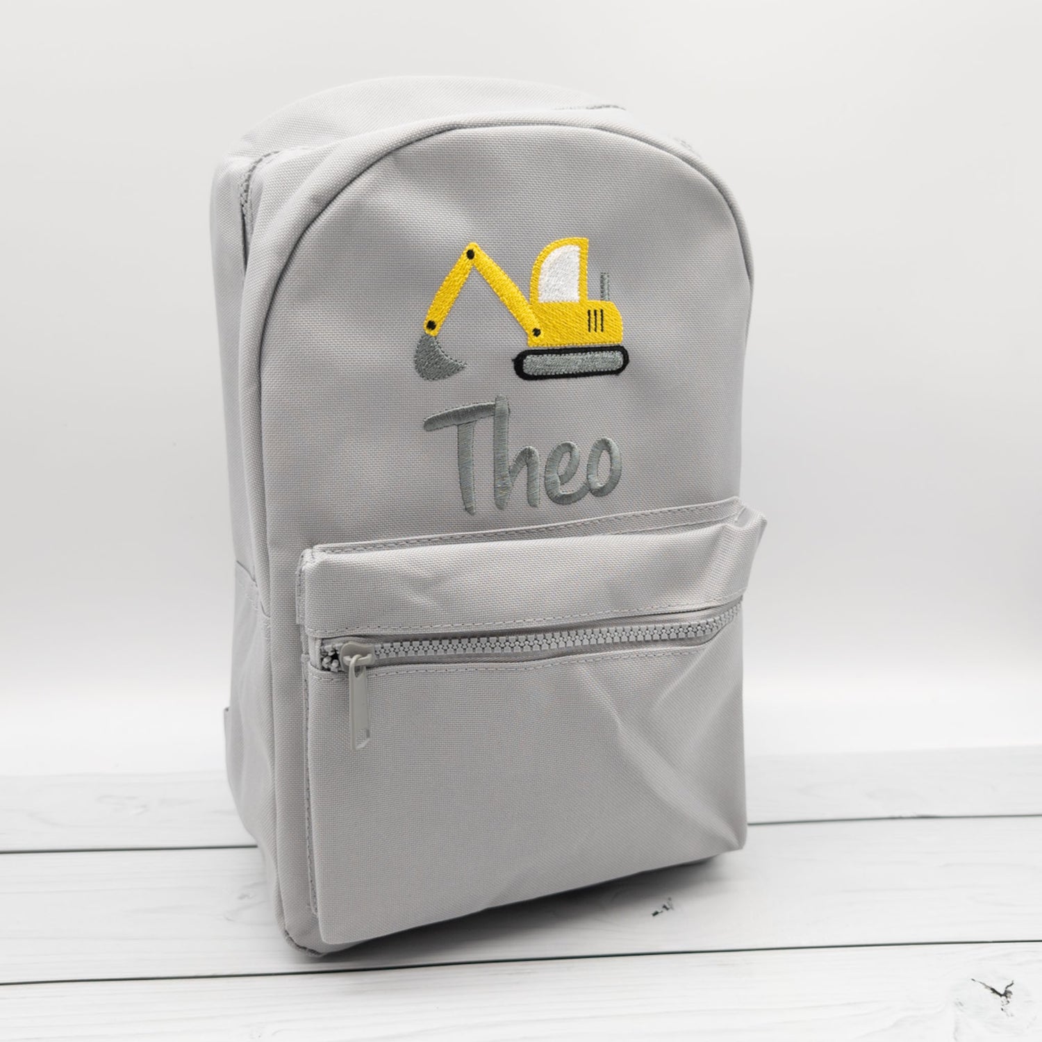 Kinderrucksack personalisiert mit Name und Bagger in 6 Farben wähbar