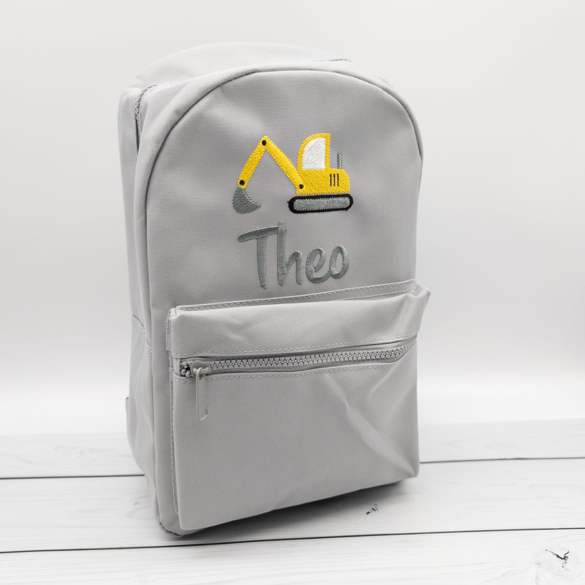 Kinderrucksack personalisiert mit Name und Bagger in 6 Farben wähbar
