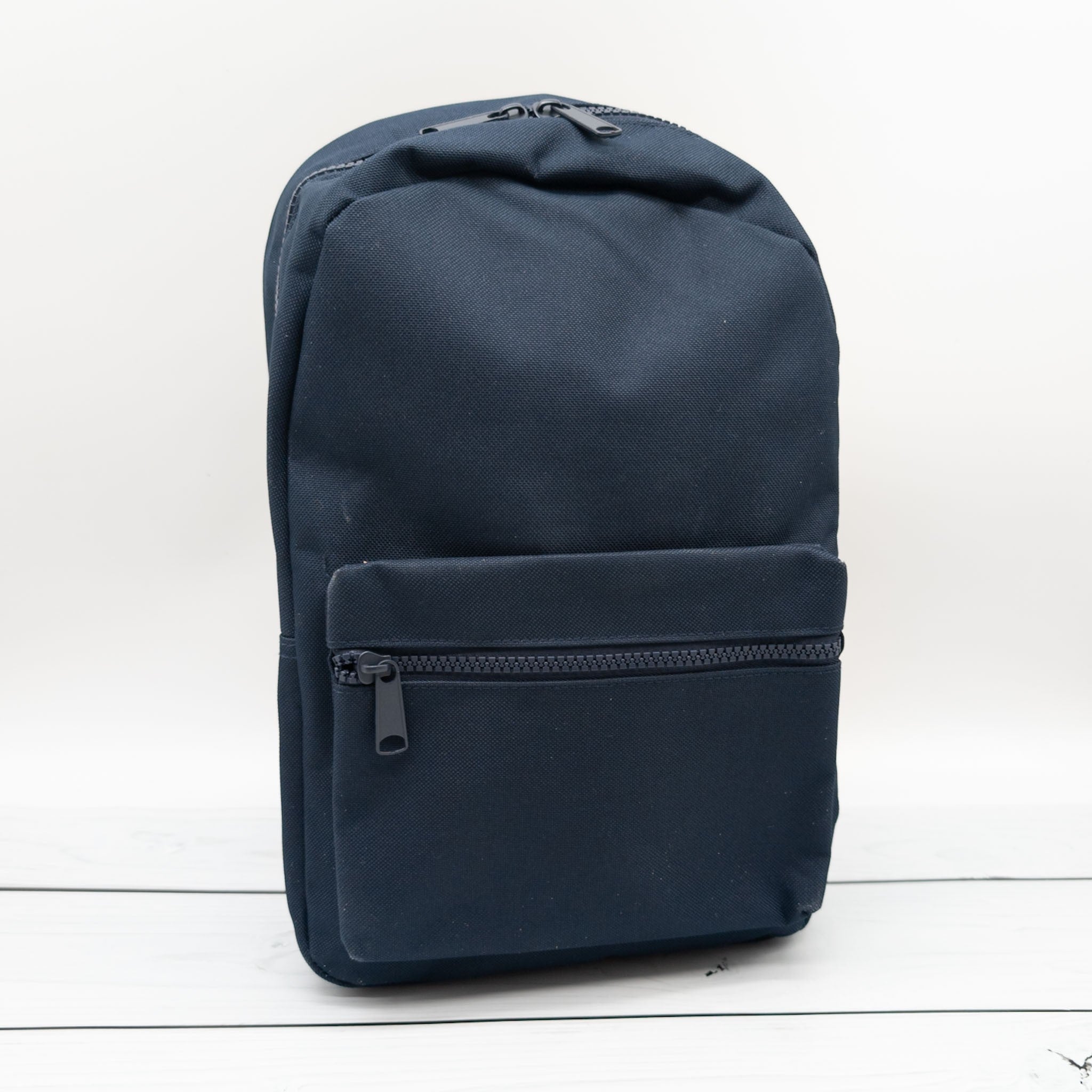 Kinderrucksack personalisiert mit Name und Bagger in 6 Farben wähbar