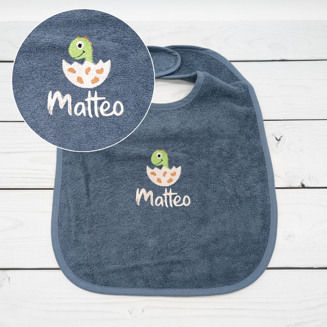 Lätzchen aus Frottee Dino im Ei und Name personalisiert
