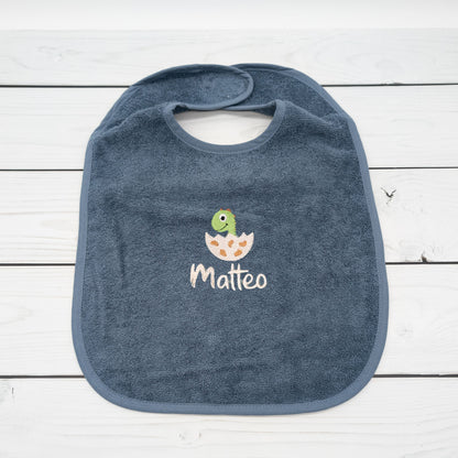 Lätzchen aus Frottee Dino im Ei und Name personalisiert