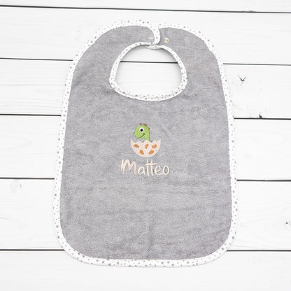 Lätzchen aus Frottee Dino im Ei und Name personalisiert